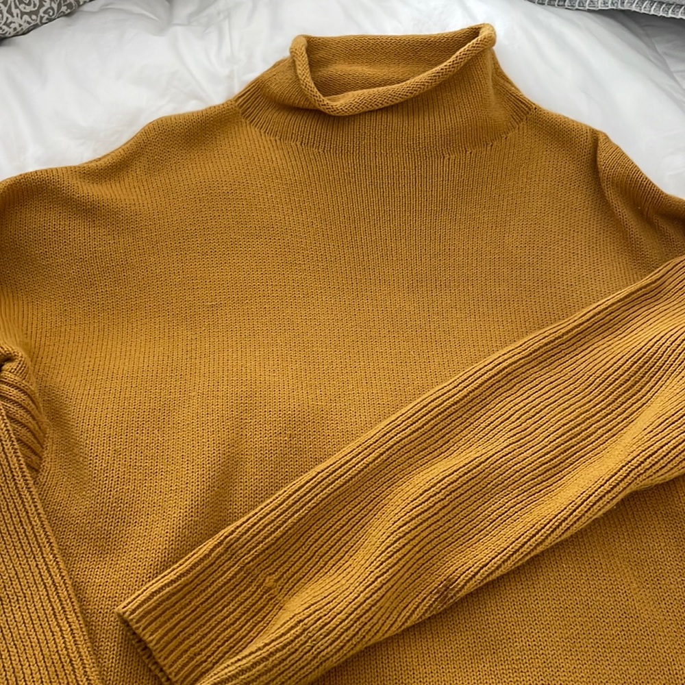 Beautiful women’s gold turtleneck sweater